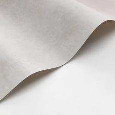 Kép 2/3 - Casadeco Elegáns bézses szürke vlies tapéta kőhatású mintázattal Prague Stone Uni Grege 53 cm X 10 m