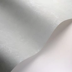 Kép 2/3 - Casadeco Elegáns égszínkék vlies tapéta kőhatású mintázattal Prague Stone Uni Bleu Ciel 53 cm X 10 m