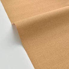 Kép 2/3 - Caselio Szövethetású karamell színű vinyl tapéta Uni Mat Caramel 53 cm X 10 m