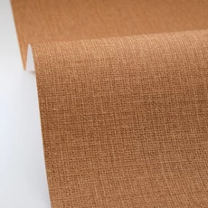 Kép 2/3 - Caselio Szövethetású barna vinyl tapéta Uni Mat Pain D Epice 53 cm X 10 m