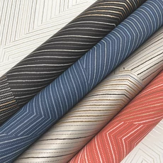 Kép 6/12 - York Modern absztrakt barna vlies tapéta Dotted Maze Glint 68,58 cm X 8,22 m